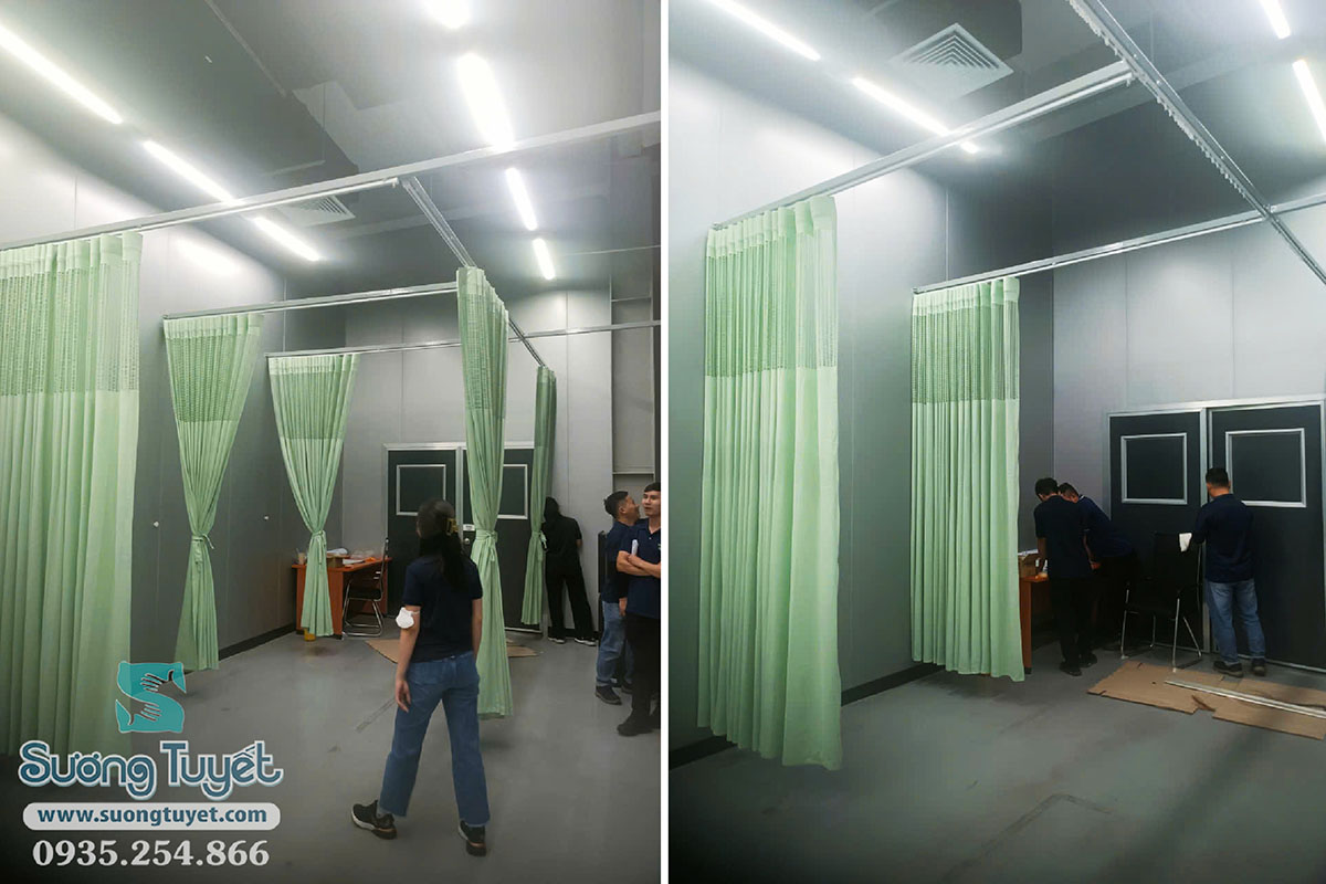 Đại diện công ty ITC Vina Đà Nẵng nghiệm thu dự án 6 bộ rèm y tế màu xanh ngọc chuyên nghiệp, sạch sẽ.